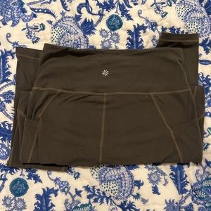 Athleta Salutation Stash Pocket Tight in Arbor Olive